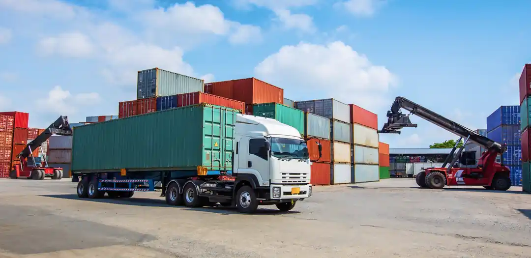 Aerial highway view with trucking and logistics fleet vehicles